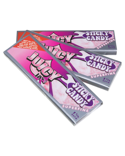 A close-up of a pack of Juicy Jay's Superfine 1-1/4" Flavored Rolling Papers with a colorful, patterned design against a white background.