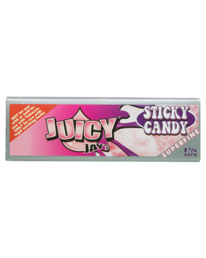 A close-up of Juicy Jay's Superfine 1-1/4" Flavored Rolling Papers, showcasing colorful branding and a patterned design.