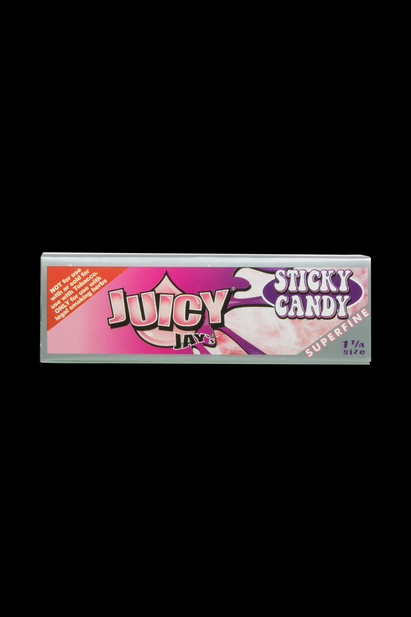 A close-up of the Juicy Jay's Superfine 1-1/4" flavored rolling papers package, displaying bold lettering against a vibrant candy-colored background.