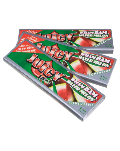 Close-up of a package of Juicy Jay's Superfine 1-1/4" Flavored Rolling Papers with colorful graphics, angled slightly toward the viewer.