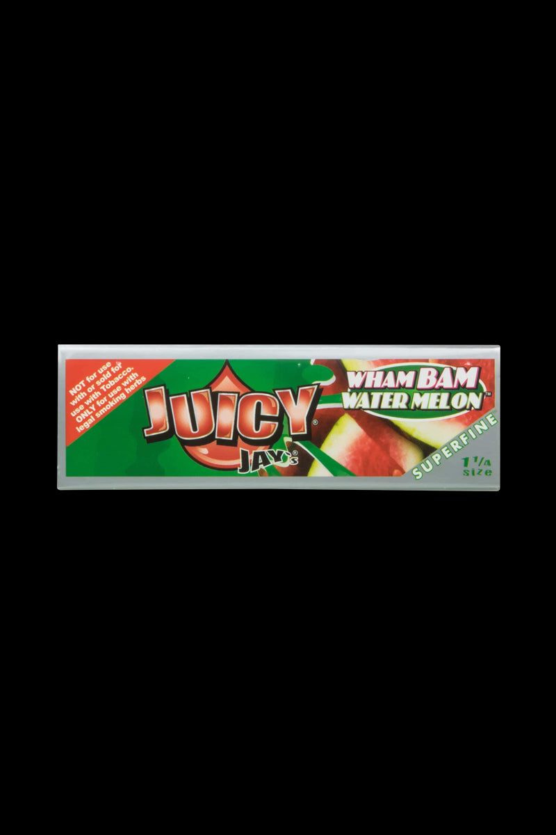 A close-up of the colorful packaging for Juicy Jay's Superfine 1-1/4" Flavored Rolling Papers with a bold, illustrative design.