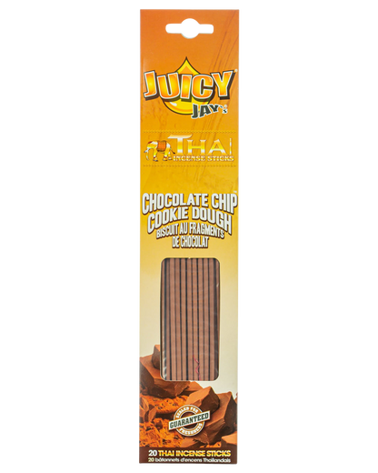 A close-up, angled shot of Thai Incense Sticks packaging featuring bright colors and bold branding, set against a dark background.