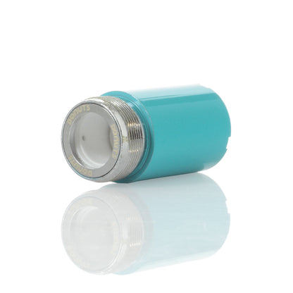 A studio shot of the Kandy Pens Donut Replacement Coil, reflecting in a mirrored surface below.