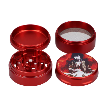 Close-up, angled view of the “Rock Legends “Jimi Fire” Grinder”, a metallic red grinder with a four-piece construction.
