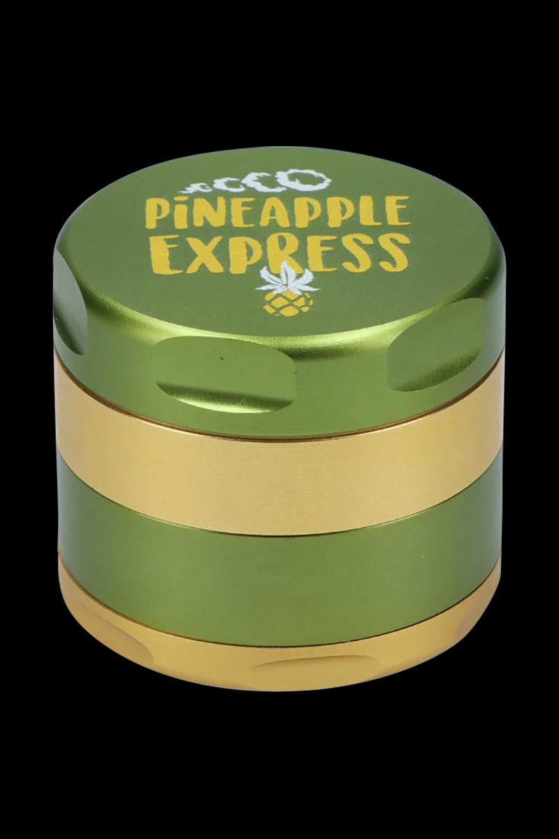 Front view of the Puff Puff Pass-Pineapple Express Strain Grinder, a silver, multi-tiered metal grinder against a dark backdrop.
