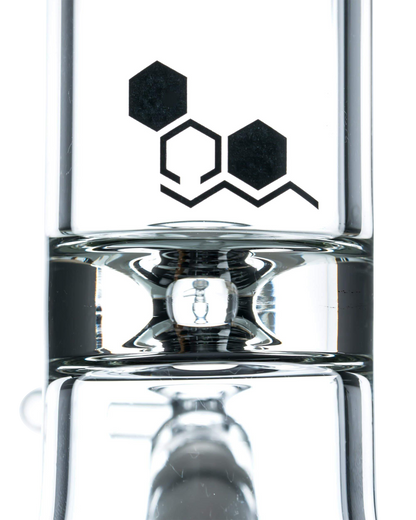 A front view of the Nucleus 12" Beaker Bong with Donut Style Ice Catcher, showcasing its clear glass construction and simple cylindrical shape.