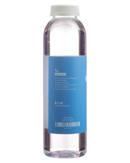 Front view of the Nucleus "IPA Clear" 99% Pure Isopropyl Alcohol bottle, displaying text instructions on a white label.