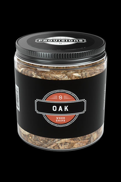Glass jar filled with wood chips labeled "Oak" with cannabis leaf-inspired branding.