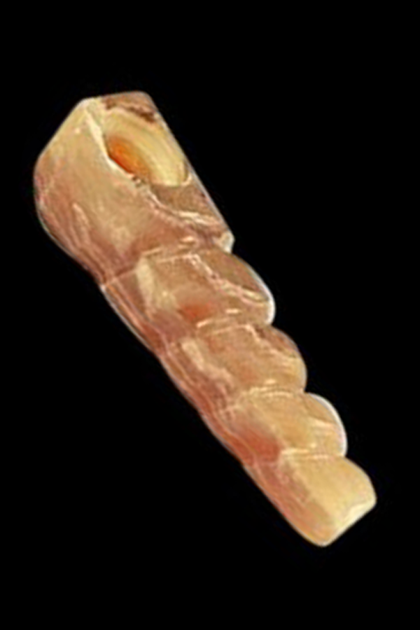 Hand-carved wooden cannabis pipe.