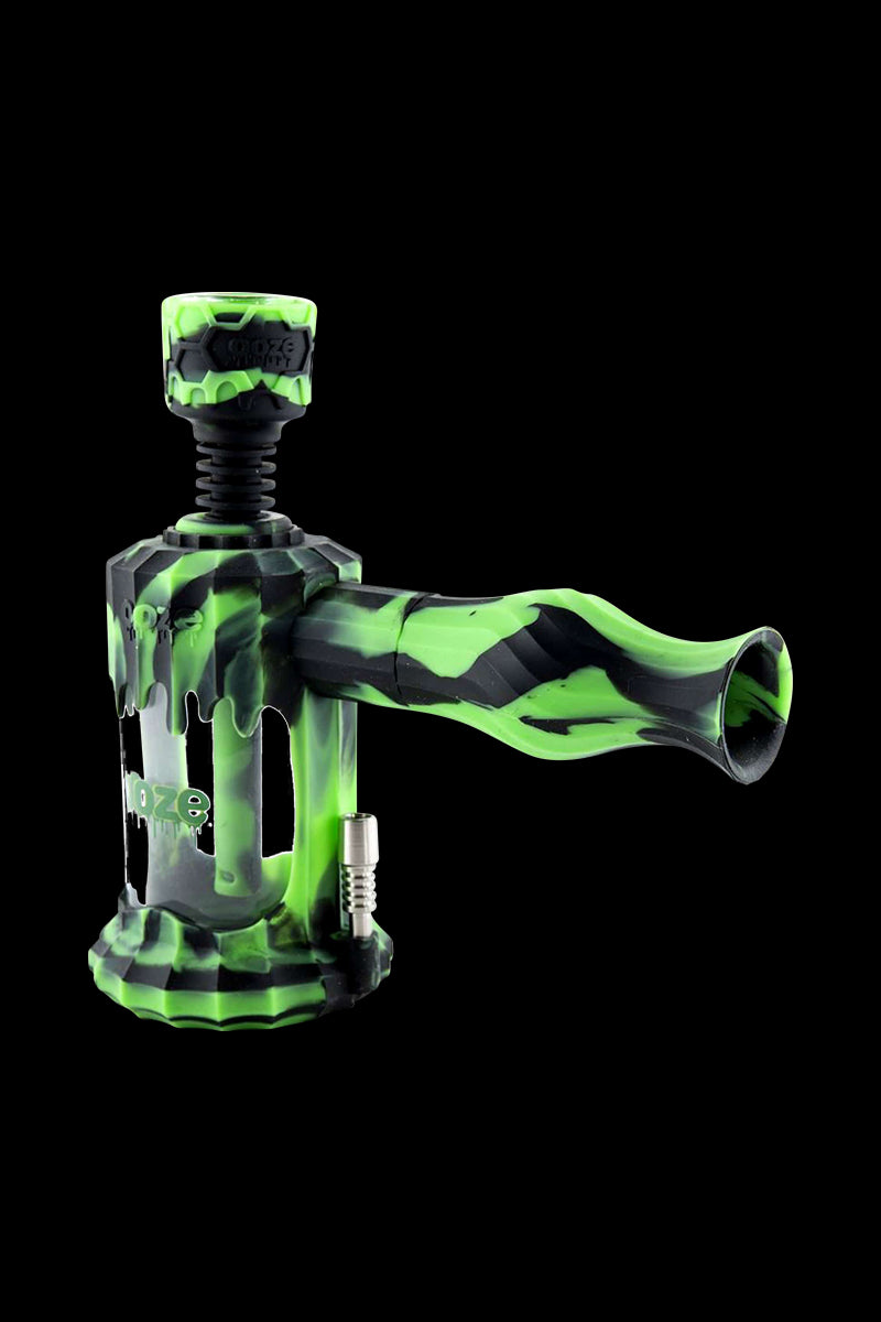 A studio shot of the Clobb 4 in 1 Silicone Pipe, showcasing its vibrant green color and unique, textured design.