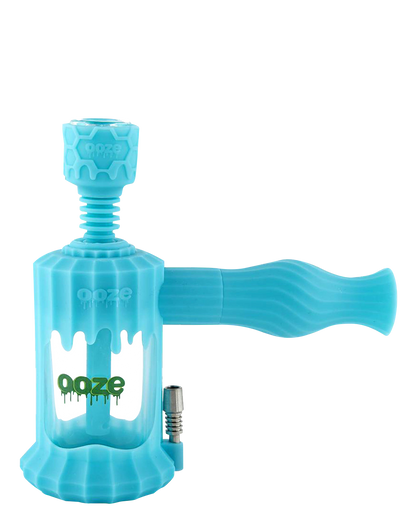 A close-up shot of the Clobb 4 in 1 Silicone Pipe, showcasing its textured, blue silicone design in a studio lighting setup.