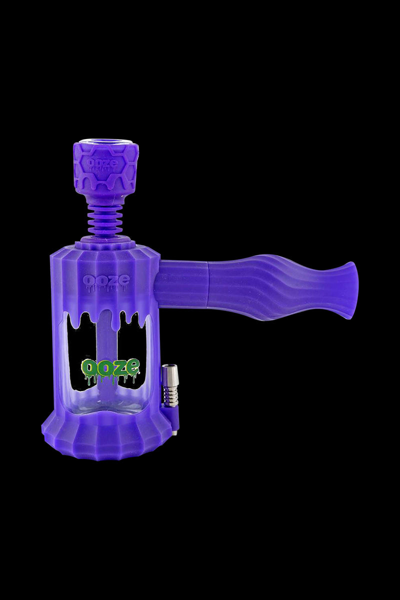 A front view of the Clobb 4 in 1 Silicone Pipe, showing the purple, textured design against a plain black background.