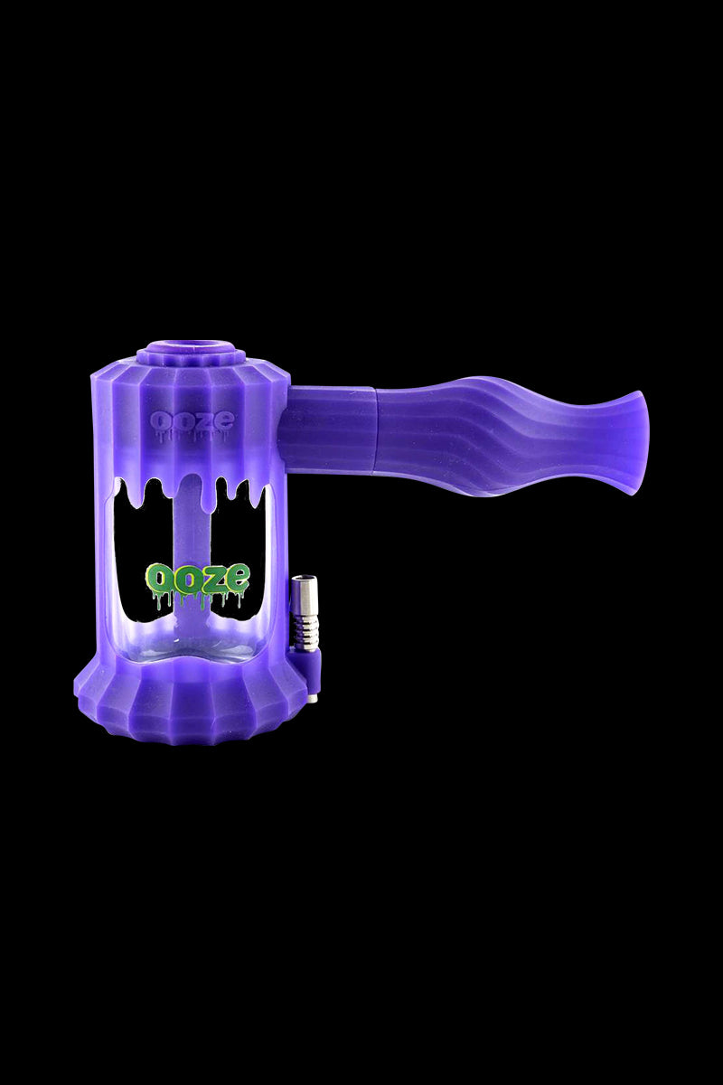 A front view of the Clobb 4 in 1 Silicone Pipe, showcasing its purple, textured design against a black background.
