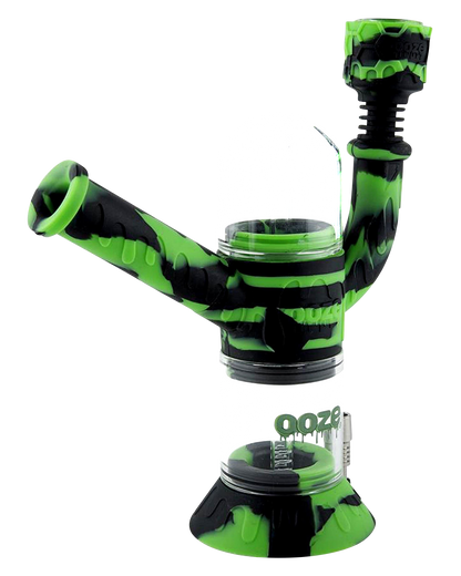 Front view of the Ooze "Cranium" Silicone 4-in-1 Glass Water Pipe, showcasing its dark green and black patterned design.