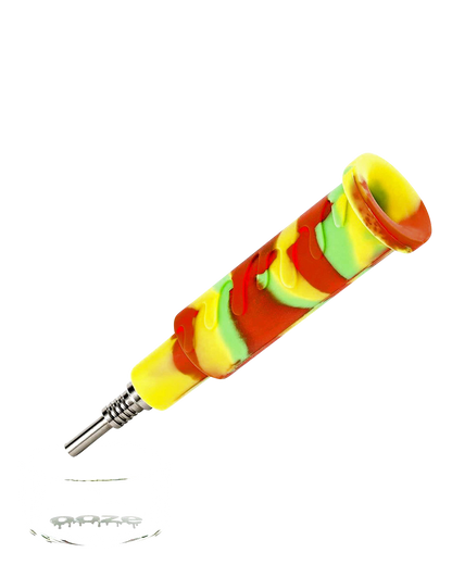 A diagonal view of the Ooze "Cranium" Silicone 4-in-1 Glass Water Pipe, showing its colorful, swirled silicone exterior.