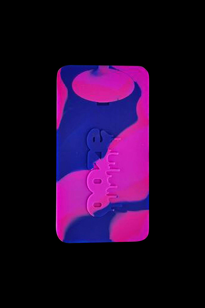 A close-up of the Ooze Slugger Dabbin Dugout, showing its compact size and dark, textured design.