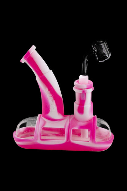 Front view of the Ooze Steamboat Silicone Bubbler Boat Bong, showing its pink silicone construction and boat-like shape.