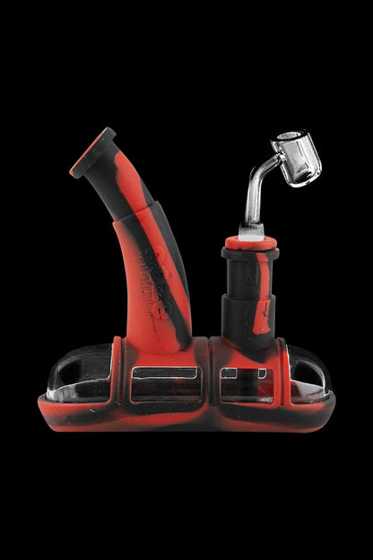 Front view of the Ooze Steamboat Silicone Bubbler Boat Bong, featuring a red, boat-shaped body and clear mouthpiece.