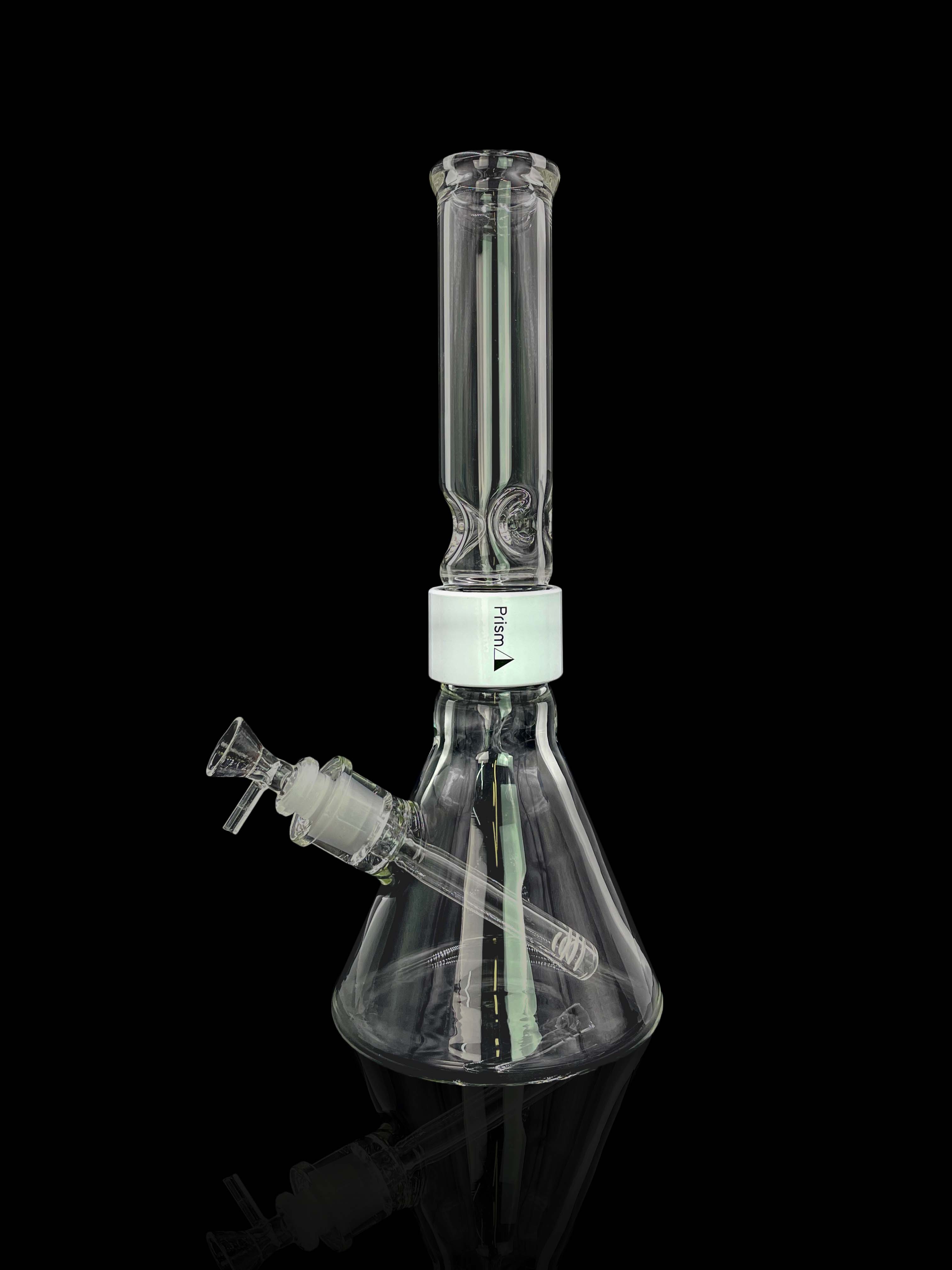 A front view of the Prism Water Pipes Starter Kit, showcasing the clear glass water pipe angled against a dark background.