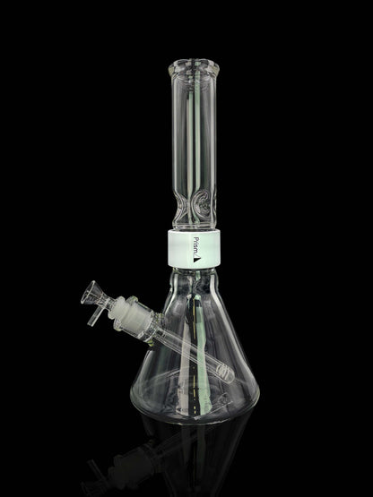 A front view of the Prism Water Pipes Starter Kit, showcasing the clear glass water pipe angled against a dark background.