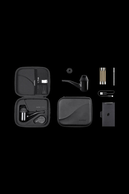 Puffco Peak Pro portable vaporizer kit displayed open in a carrying case, including device, accessories, and charging cable.