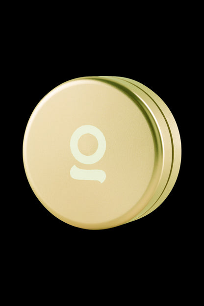 Gold cannabis tin with the number “10” embossed on the lid.