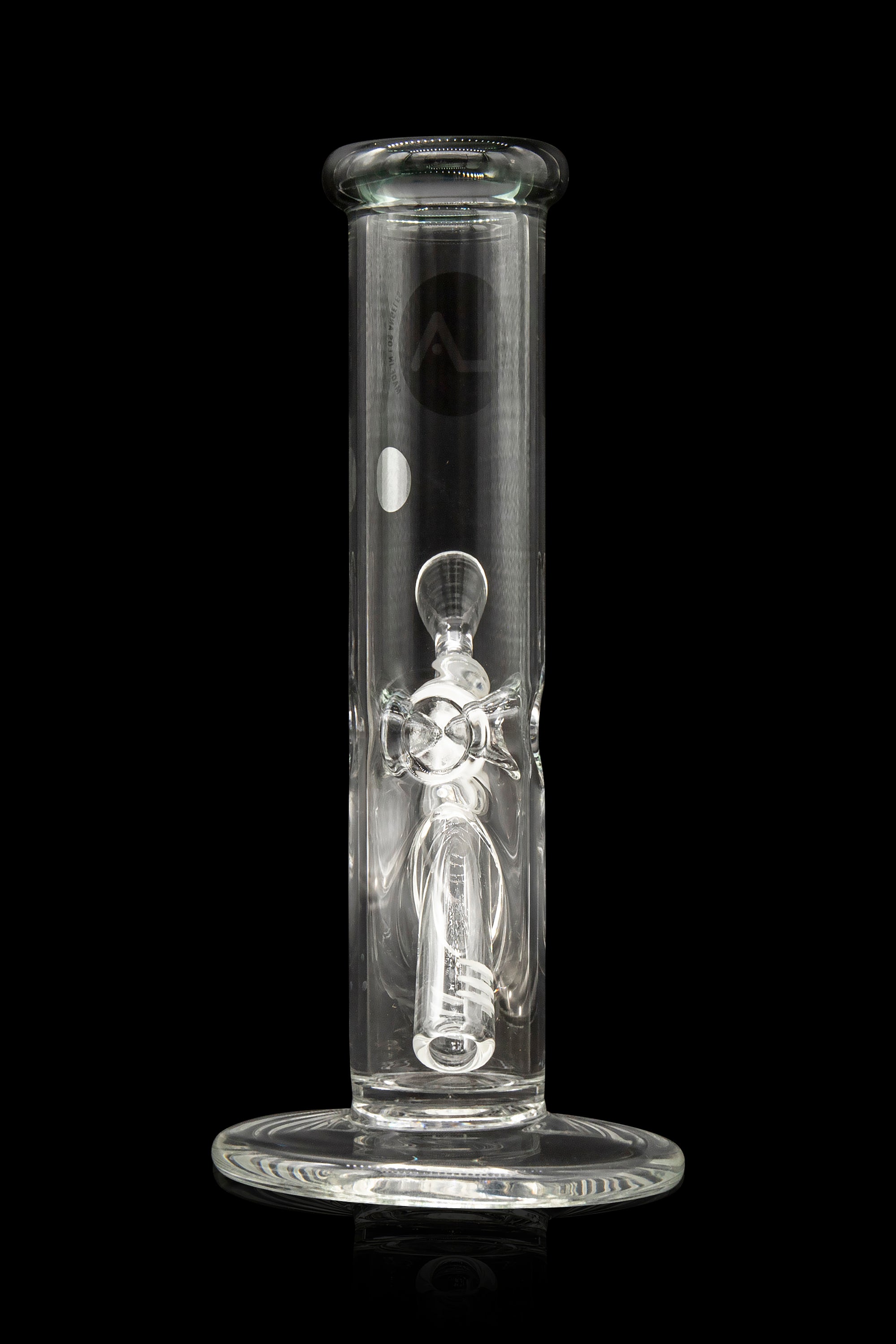 Clear glass bong with intricate sculpted design, isolated on black.