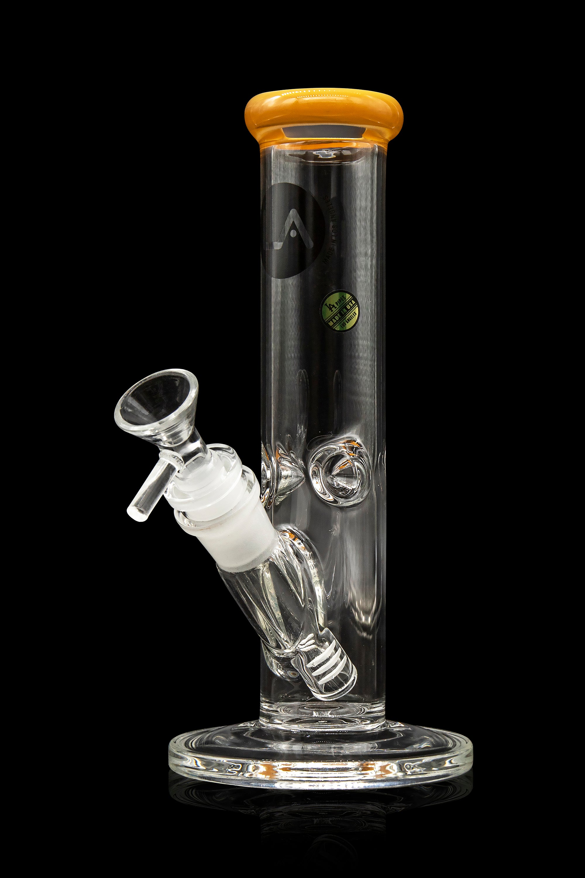 Clear glass bong with intricate design and detachable bowl.