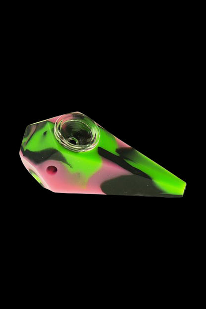 The Silicone Diamond Hand Pipe with Glass Bowl is shown in a close-up, angled view, highlighting its colorful, textured design.