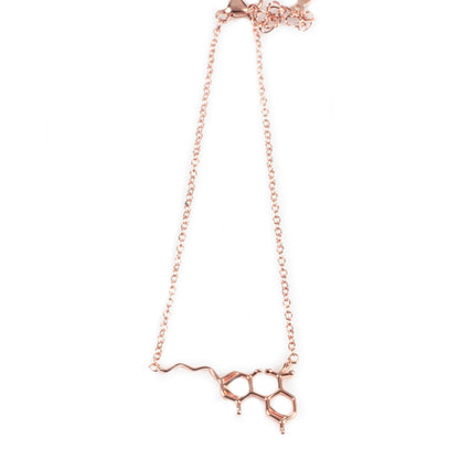 A close-up view of the Smoke Cartel THC Molecule Bracelet, showcasing the delicate, interconnected chain links forming a molecular structure.