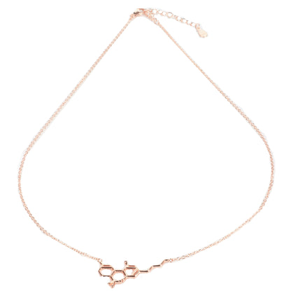 A close-up of the Smoke Cartel THC Molecule Necklace, featuring a delicate, silver-tone chain and pendant shaped like a molecular structure.