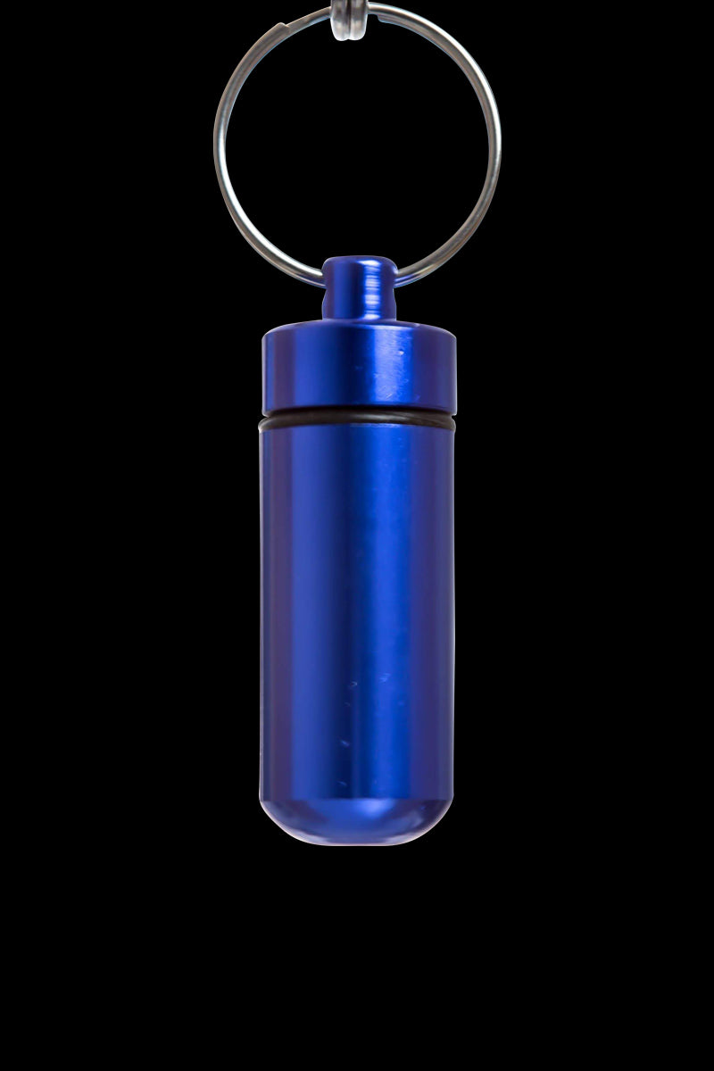 A front view of the Discrete Key Chain Stash Jar, a small, blue metal container with a key ring attached.