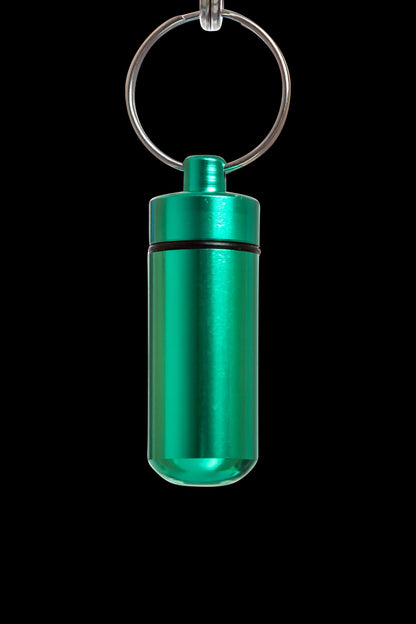 Front view of the Discrete Key Chain Stash Jar, a silver, cylindrical container with a key chain loop.