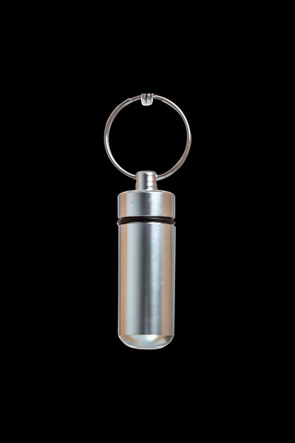 Front view of the Discrete Key Chain Stash Jar, a silver-toned cylindrical container with a key ring attached.