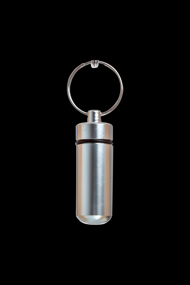 Front view of the Discrete Key Chain Stash Jar, a silver-toned cylindrical container with a key ring attached.