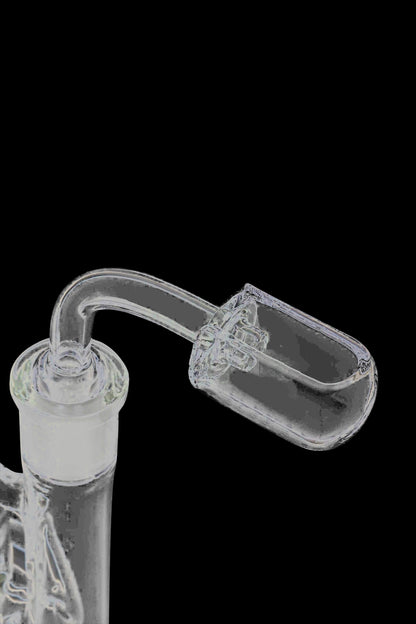 A close-up view of the Quartz Capsule Banger Nail, displaying its clear, cylindrical shape and smooth glass construction.