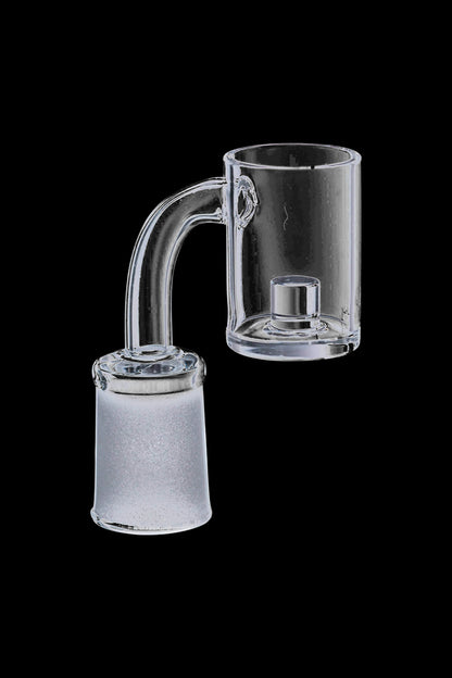 A close-up, angled view of the Quartz Core Reactor Banger Nail, showcasing its clear quartz construction and cylindrical shape.