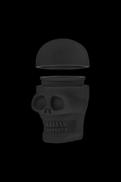 A top-down view of the Silicone Non-Stick “Skull” Stash Container, showcasing its dark, sculpted design.