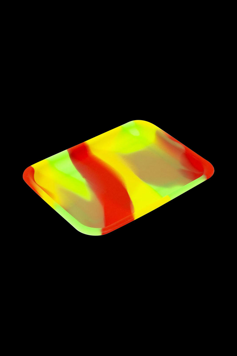 The Silicone Concentrate Tray is displayed as a top-down view of a small, dark-colored dish.