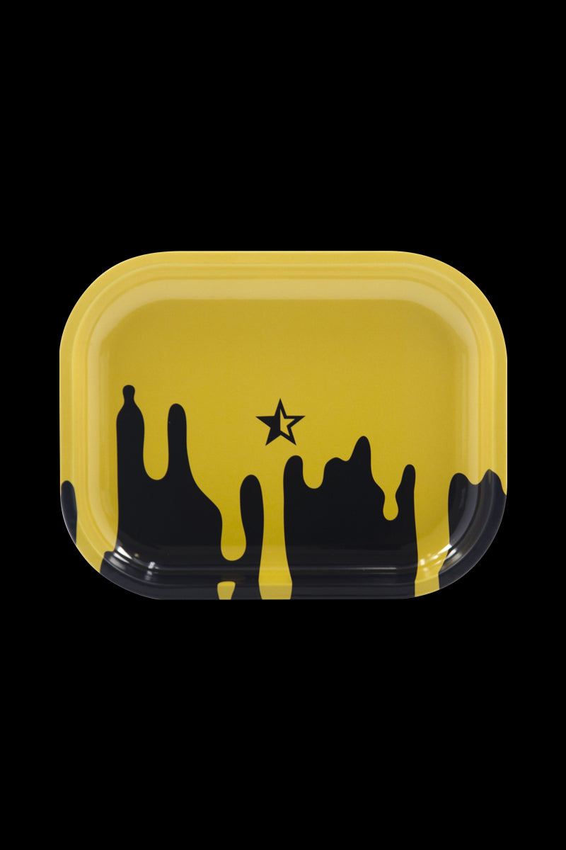 The "Famous Brandz "Surrender" Rolling Tray" is pictured as a flat, rectangular tray with a dark, patterned design against a plain background.