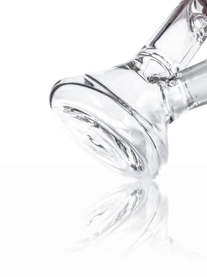 A side view of the Tank Glass "MAX" Beaker Bong, showcasing its clear glass construction and rounded beaker shape.