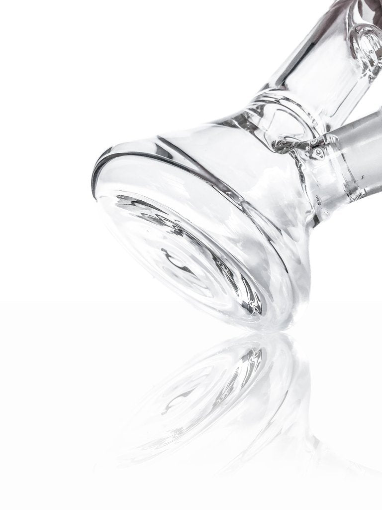 A side view of the Tank Glass "MAX" Beaker Bong, showcasing its clear glass construction and rounded beaker shape.