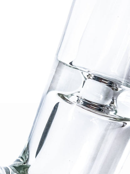 Close-up view of the Tank Glass Straight Tube Bong, showcasing its clear glass construction and simple cylindrical shape.