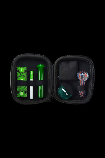 Open black case displaying cannabis accessories including a glass pipe, grinder, and container with the “HappyKit” logo.