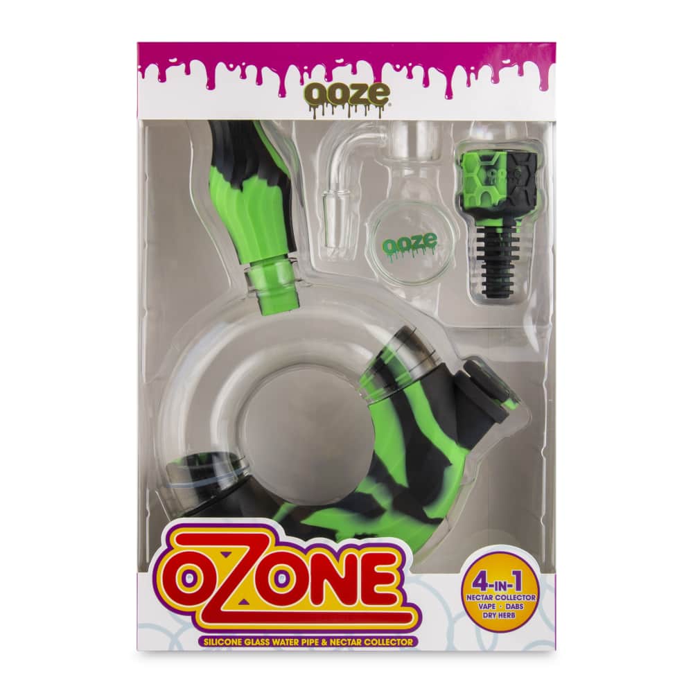 A packaged, green and clear silicone water pipe and nectar collector set branded “Ozone” with text indicating it’s a 4-in-1 multi-use device for various cannabis concentrates and dry herb.