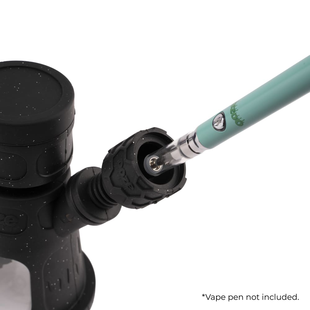Black glass bubbler with a teal vape pen cartridge inserted into the opening.