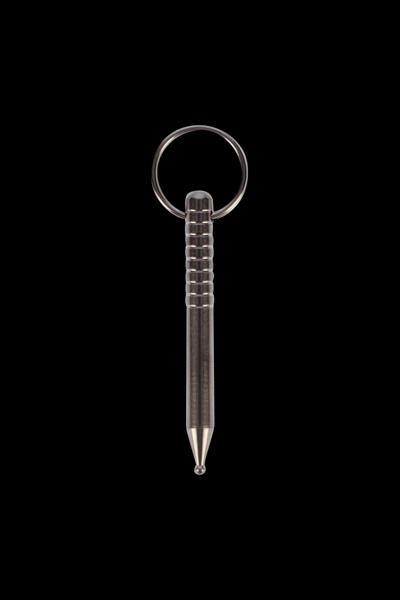 A close-up studio shot of the Titanium Dabber with Keychain Hoop, displaying its metallic finish and compact size with a key ring attached.