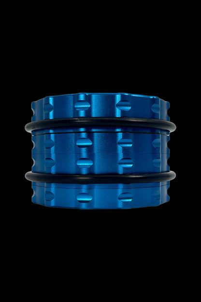 Stacked blue cannabis rig percolator diffusers on black background.