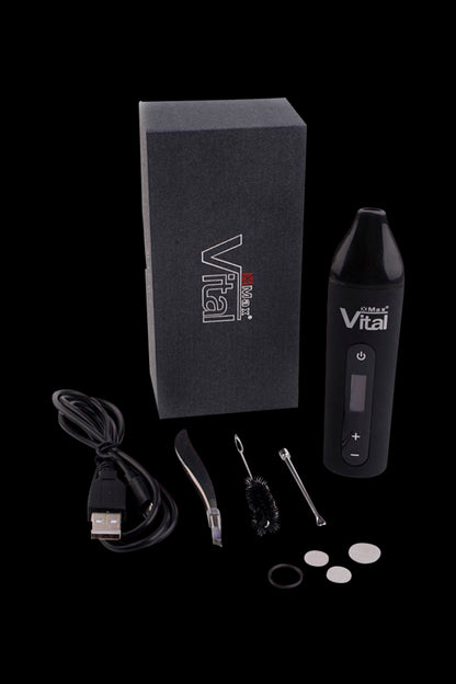 Vital Max cannabis vaporizer pen kit with charging cable, tools, and oil cartridges.