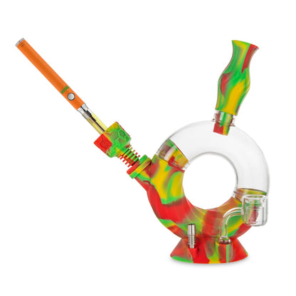 Red and green silicone bubbler with glass bowl and dab tool.